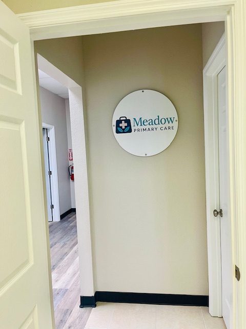 Meadow Primary Care Ellenton logo sign