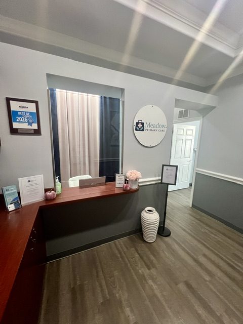 Front desk at Meadow Primary Care in Lakewood Ranch, with our Best of Florida 2026 award